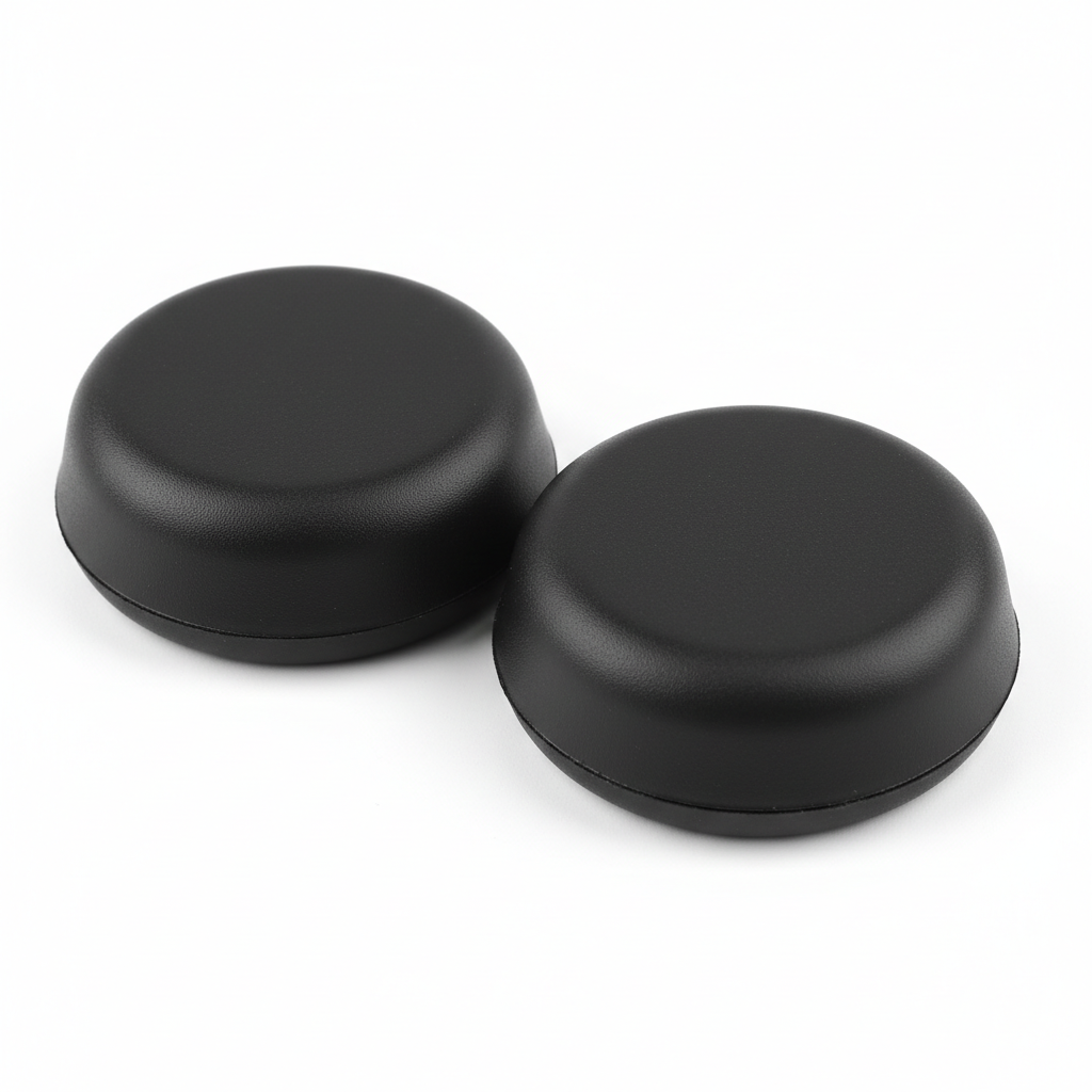 Close-up of plain matte black material texture on motorcycle knee slider replacement puck
