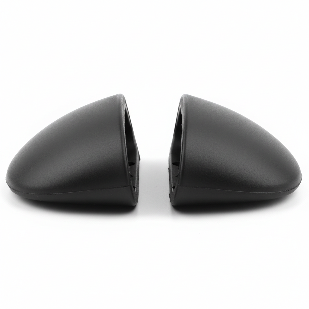 Plain black motorcycle knee slider replacement puck set, side view on white background