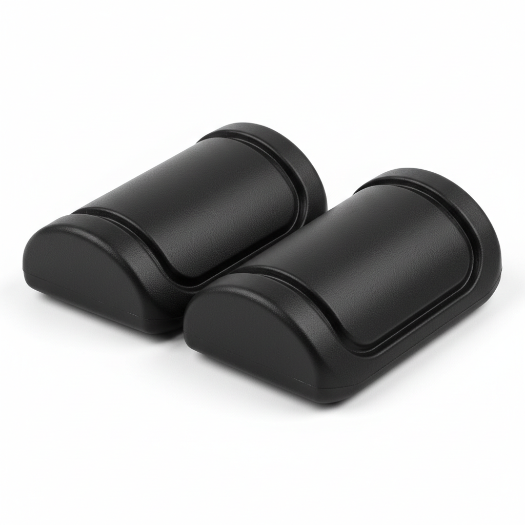 Plain black motorcycle knee slider replacement puck set, three-quarter front view on white background