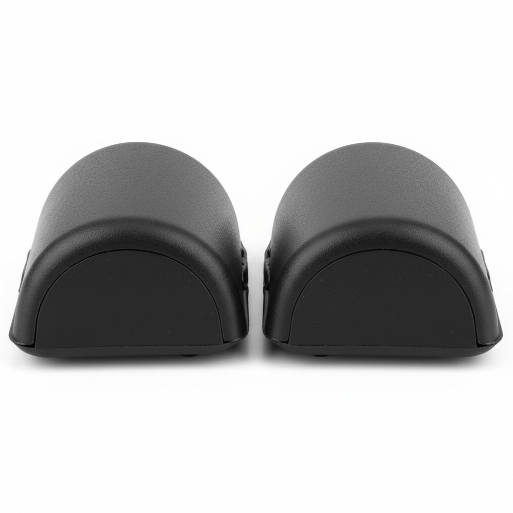 Plain black motorcycle knee slider replacement puck set, rear view on white background